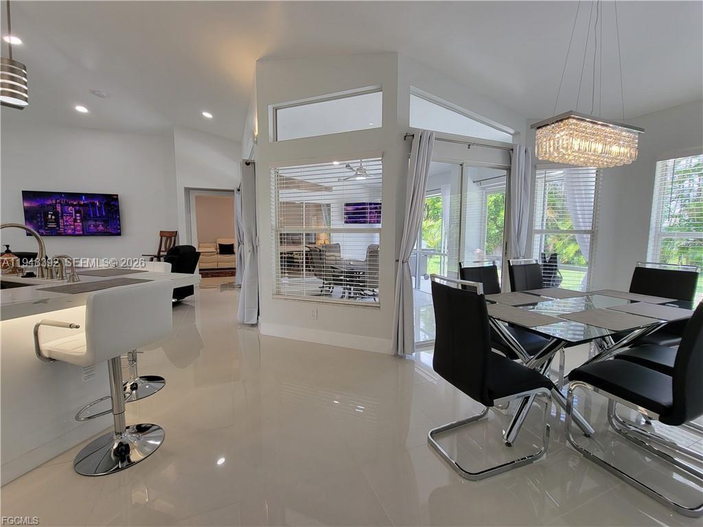 237 Southwest 47th Street Cape Coral, FL 33914 - Photo 16 of 50 a workspace with furniture