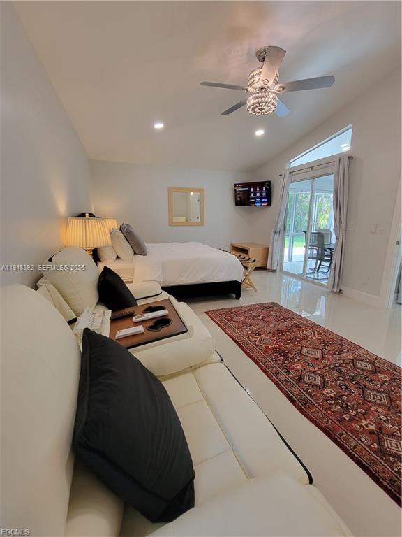 237 Southwest 47th Street Cape Coral, FL 33914 - Photo 21 of 50 a bedroom with bed and window