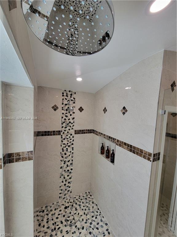 237 Southwest 47th Street Cape Coral, FL 33914 - Photo 32 of 50 a bathroom with a shower