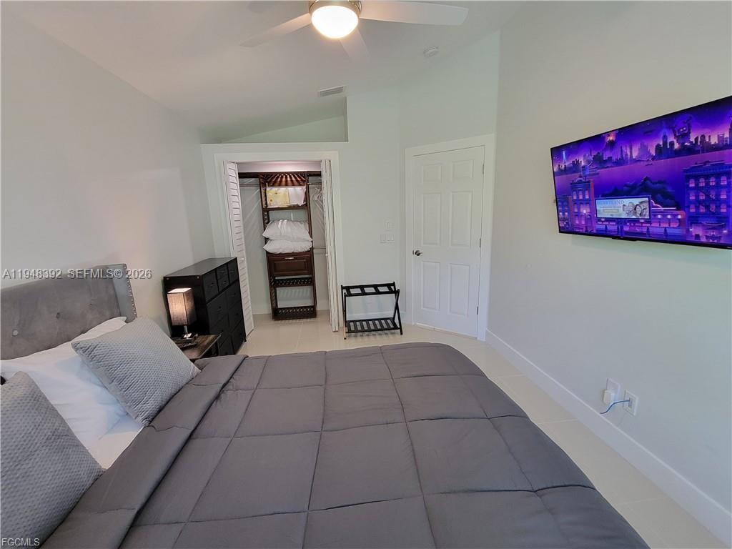 237 Southwest 47th Street Cape Coral, FL 33914 - Photo 34 of 50 a view of an empty room with a fireplace and cabinet