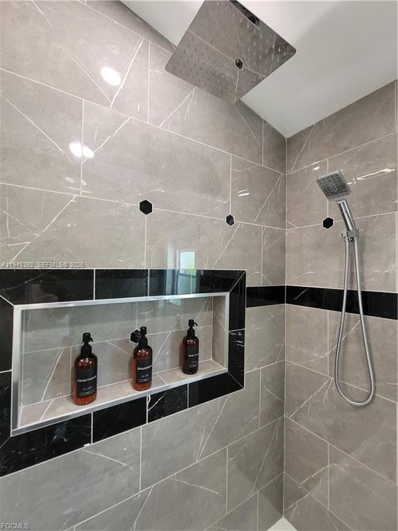 237 Southwest 47th Street Cape Coral, FL 33914 - Photo 39 of 50 a bathroom with a shower