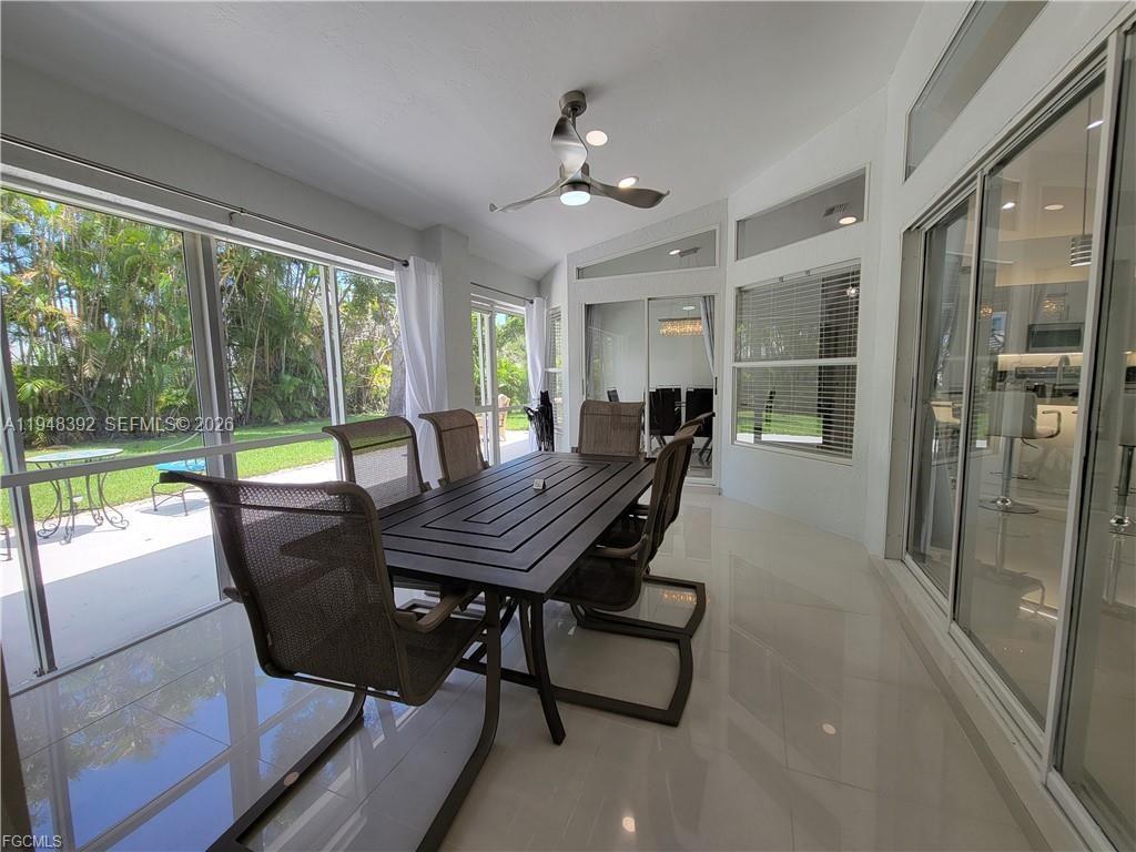237 Southwest 47th Street Cape Coral, FL 33914 - Photo 44 of 50 a view of a dining room with furniture window and outside view