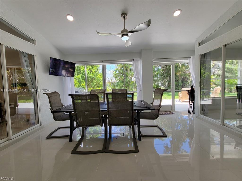 237 Southwest 47th Street Cape Coral, FL 33914 - Photo 9 of 50 a view of a dining room with furniture window and outside view