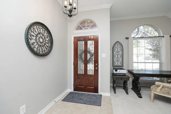 a view of a livingroom with furniture and window