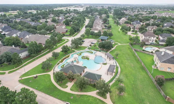 a view of a golf course with a lake