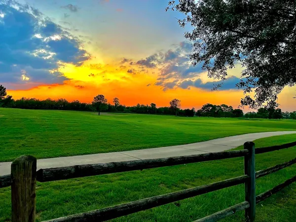a sign that is sitting on a park