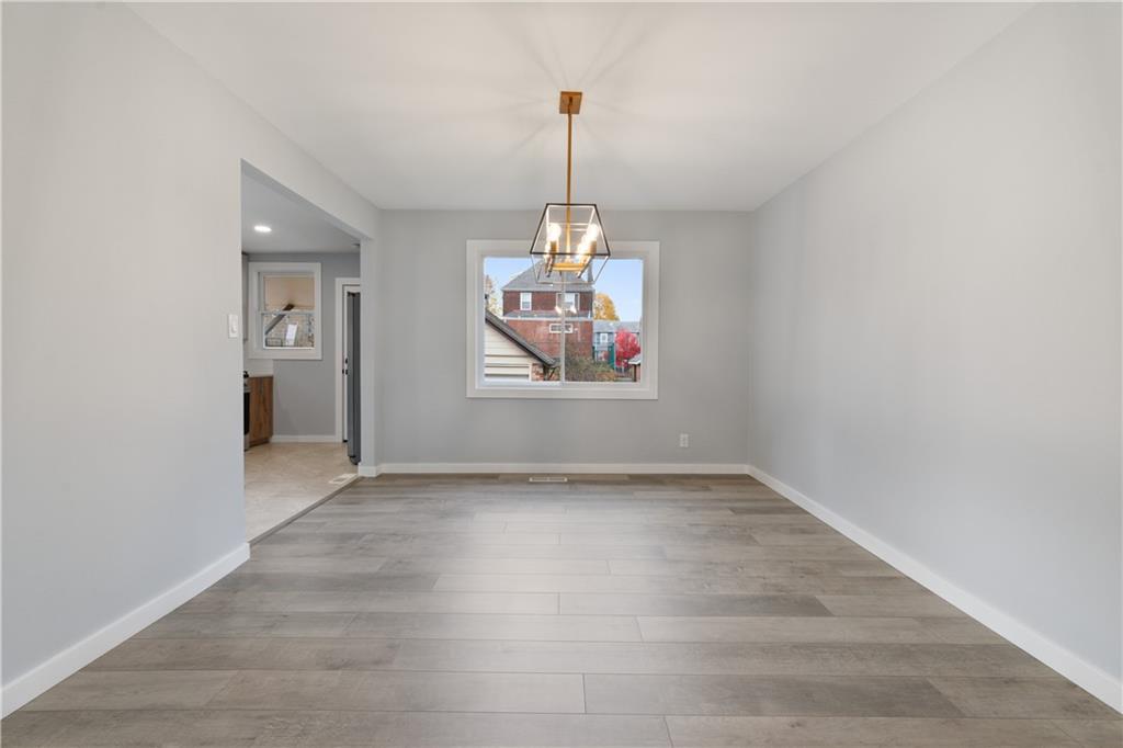 3030 Shady Avenue Pittsburgh, PA 15217 - Photo 20 of 31 a view of a chandelier in wooden floor and a window