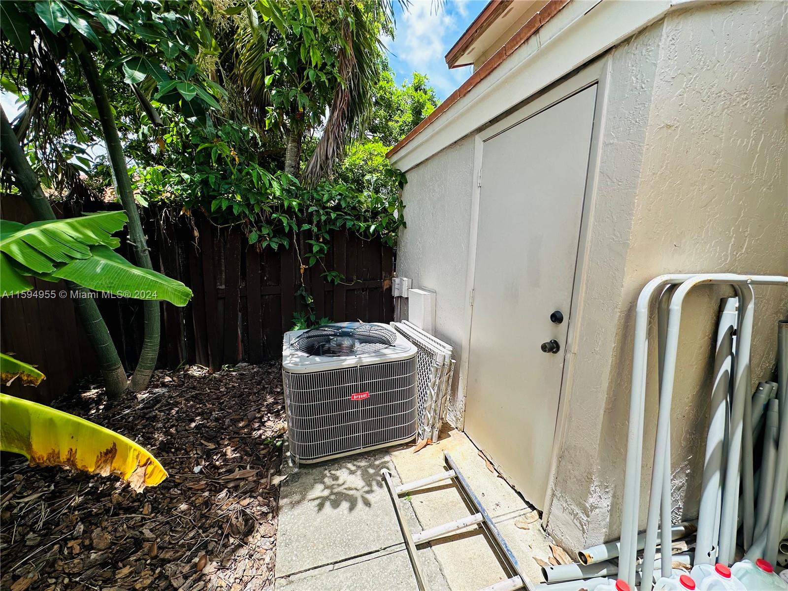 15056 Southwest 127th Place Miami, FL 33186 - Photo 19 of 25 a view of outdoor space and yard