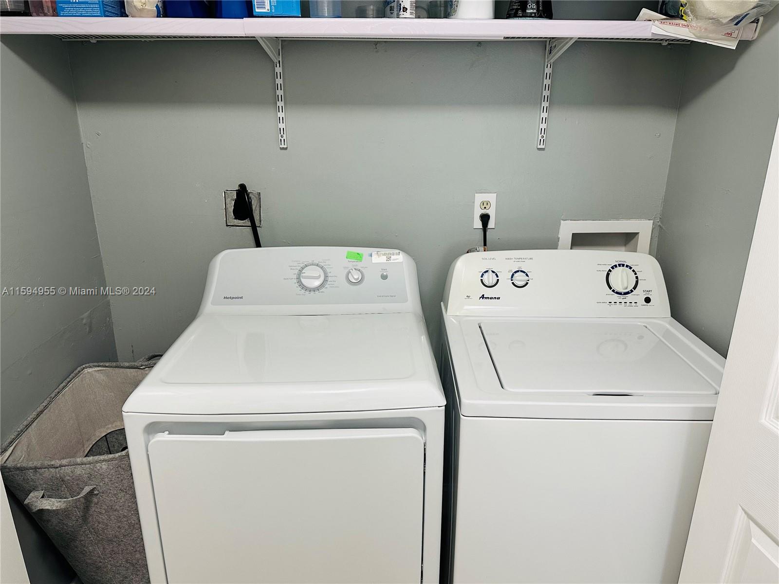 15056 Southwest 127th Place Miami, FL 33186 - Photo 10 of 25 a utility room with dryer and washer