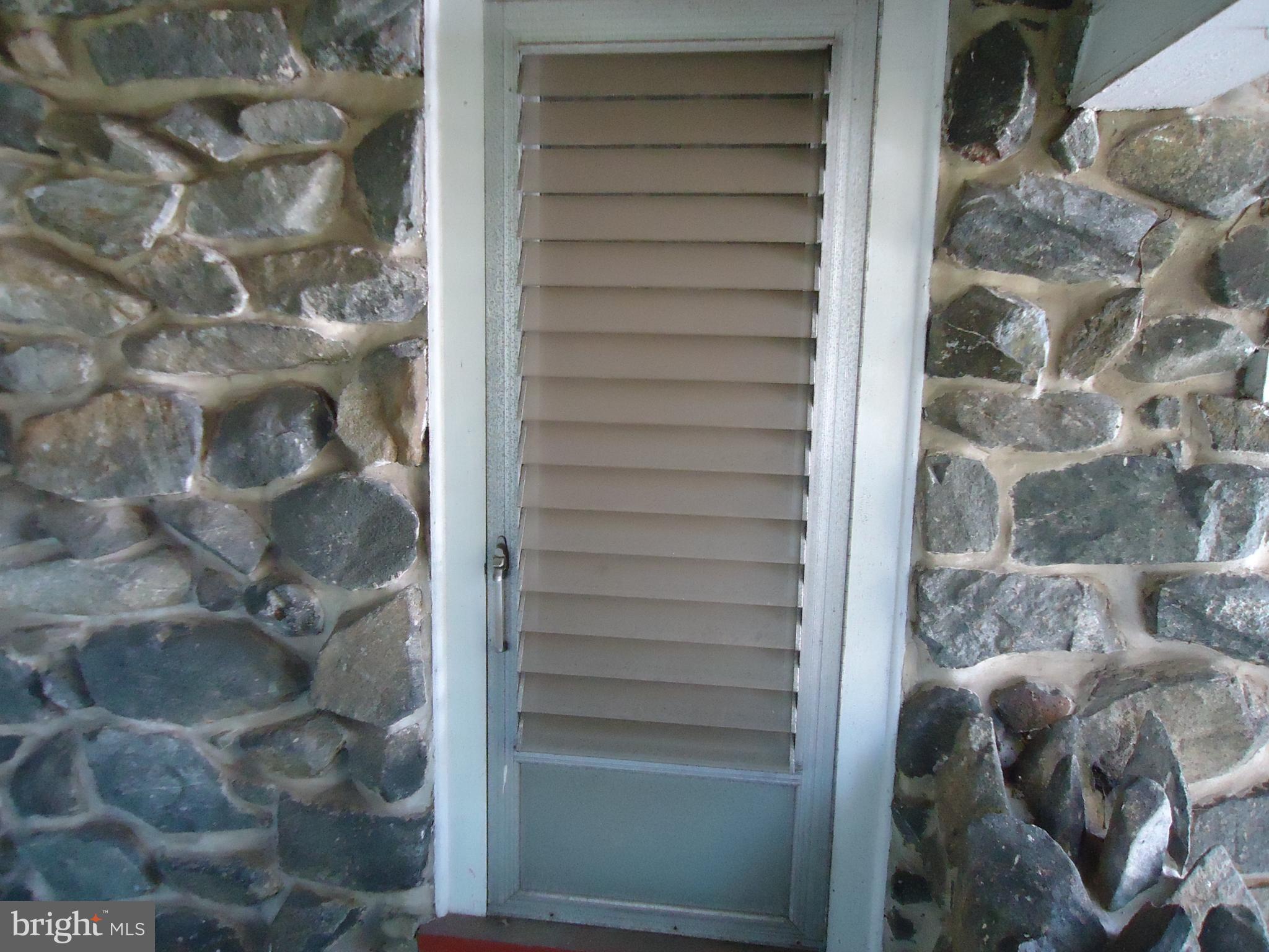 1000 Walnut Avenue Baltimore, MD 21229 - Photo 7 of 52 Exterior Side Porch Door