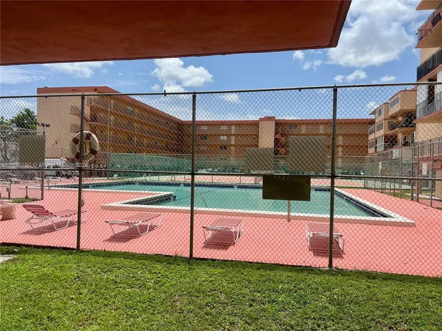 a small garden and tall chair