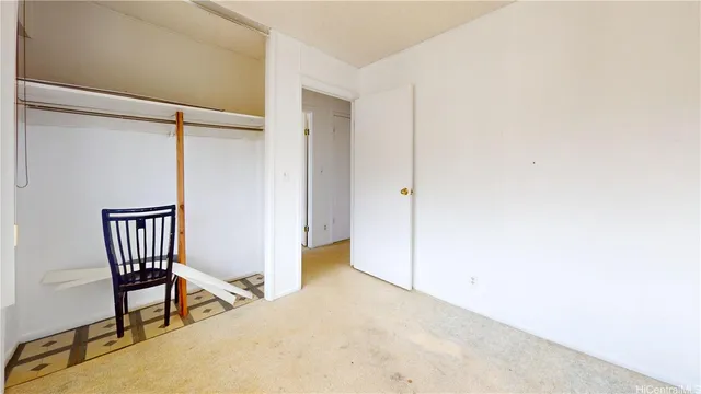 a view of a hallway with staircase