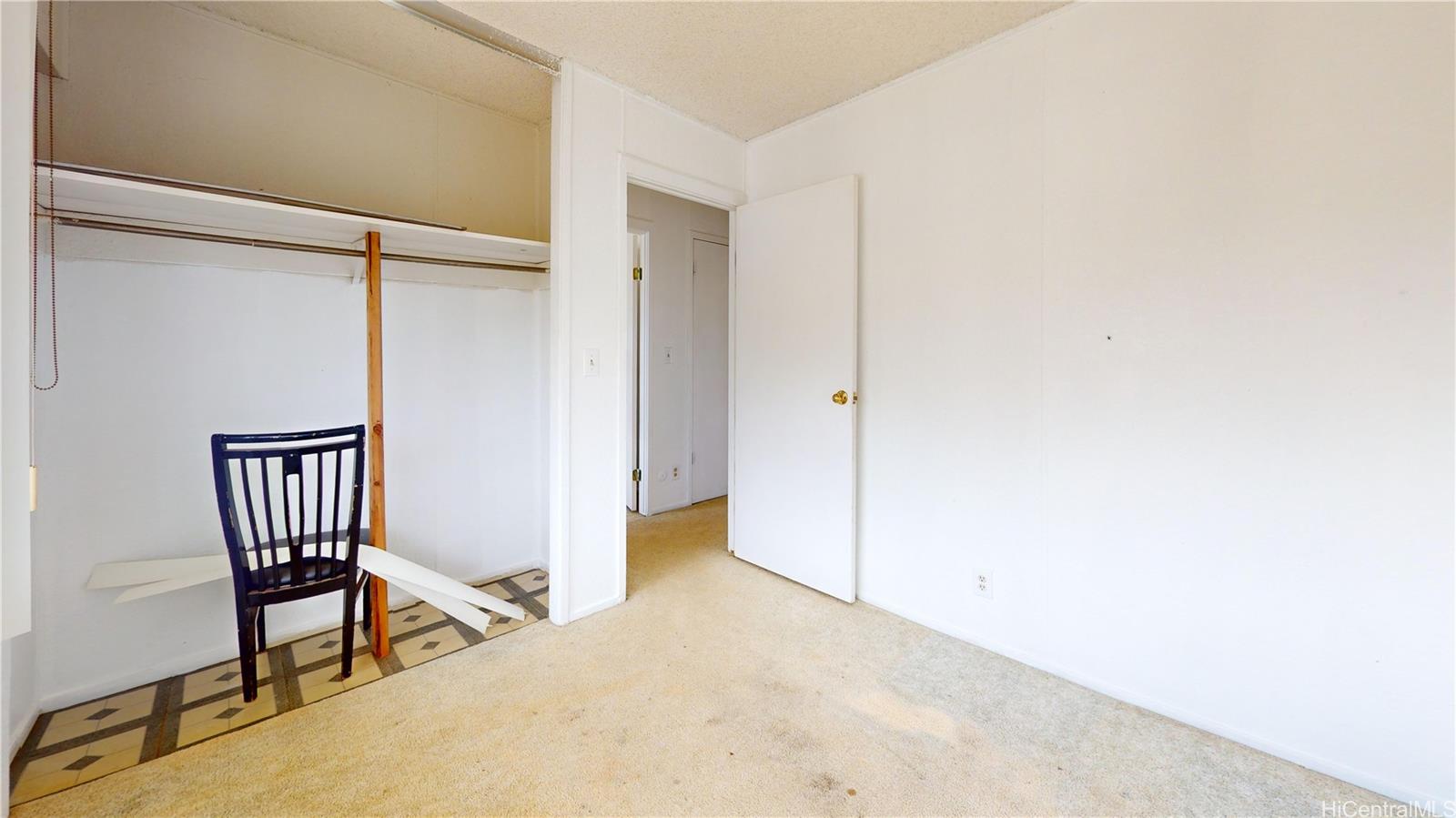 85-128 Ala Walua Street, Unit B Waianae, HI 96792 - Photo 13 of 16 a view of a hallway with staircase