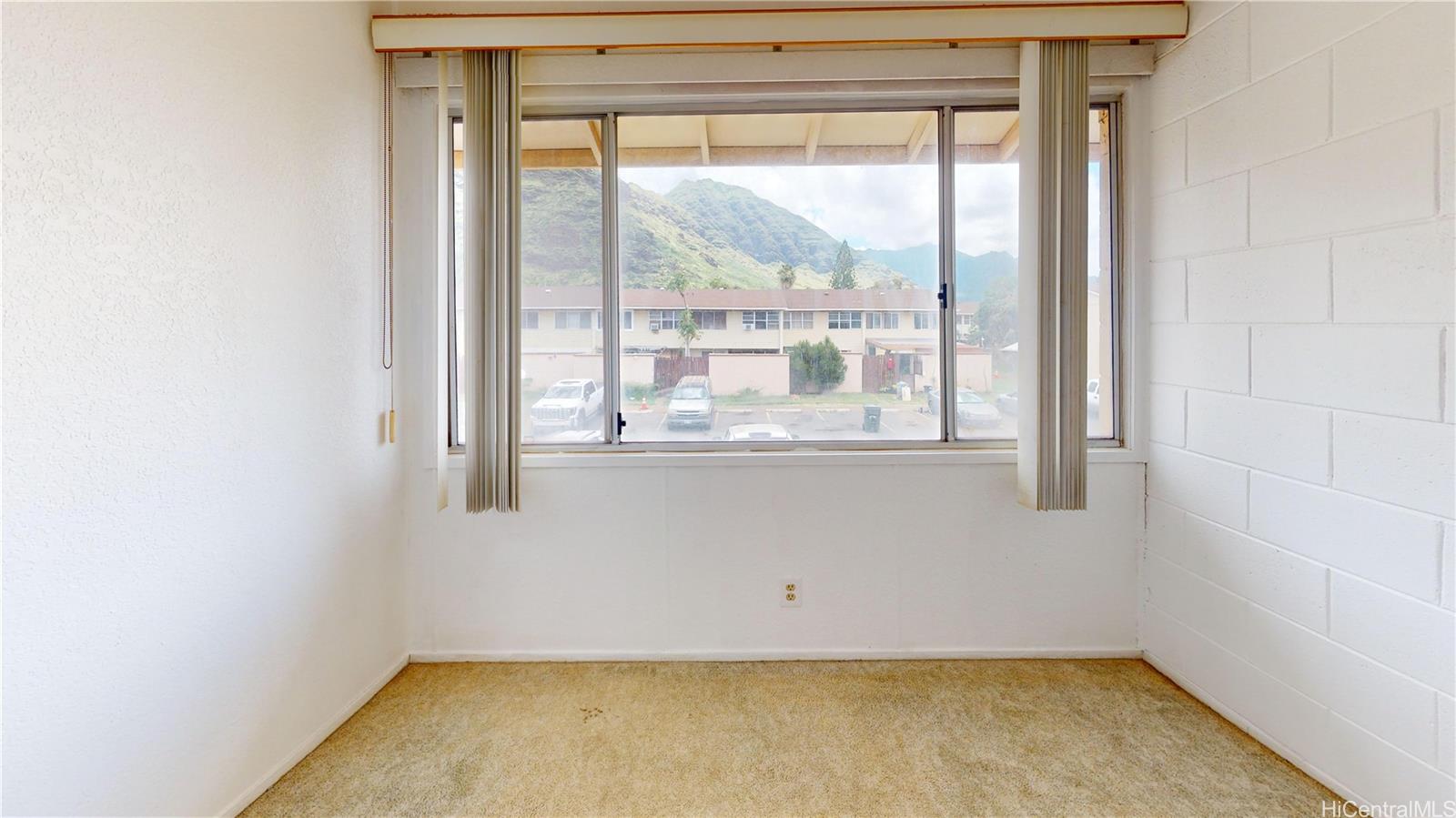 85-128 Ala Walua Street, Unit B Waianae, HI 96792 - Photo 15 of 16 a view of a room with window