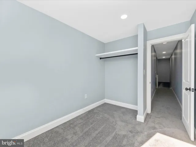 a bathroom with a bathtub and a toilet