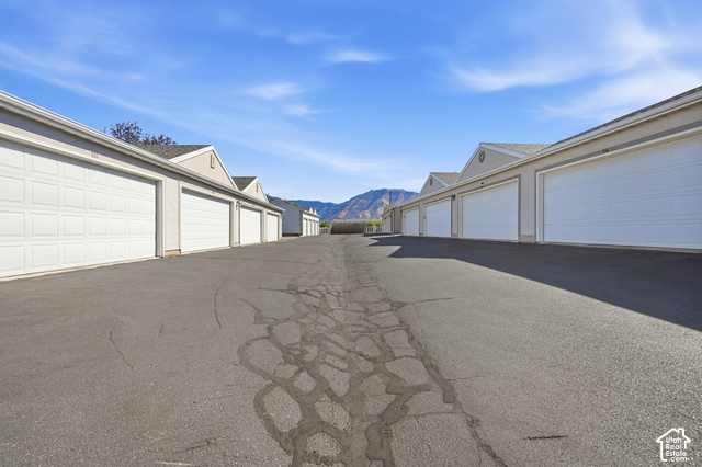 108 Penhurst Place Logan, UT 84341 - Photo 36 of 44 Row of individual garage bays with panel doors