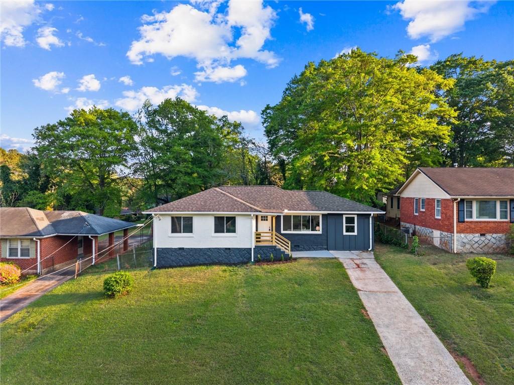 a house view with a garden space