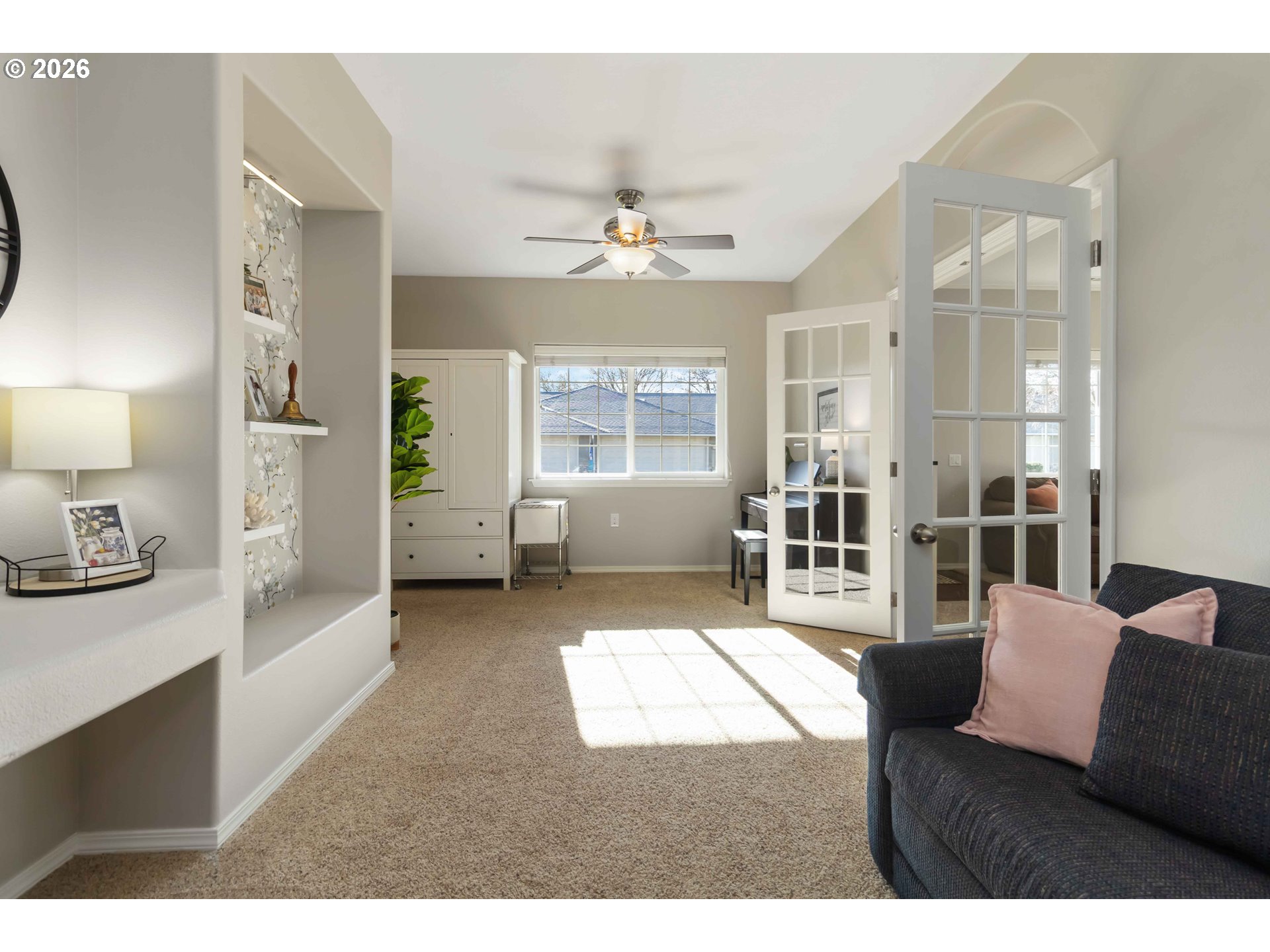 5558 Solo Point Drive Longview, WA 98632 - Photo 11 of 40 a living room with furniture and a chandelier
