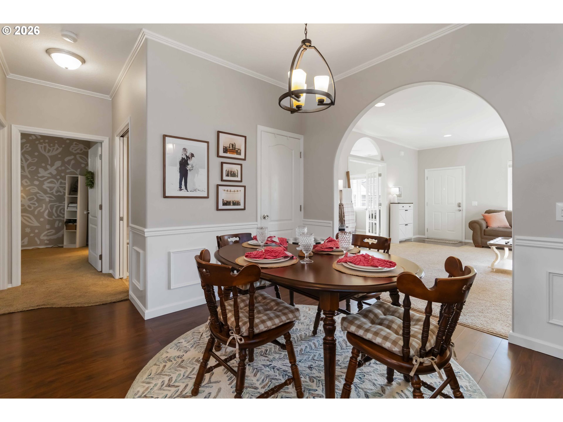 5558 Solo Point Drive Longview, WA 98632 - Photo 15 of 40 a view of a dining room with furniture and wooden floor