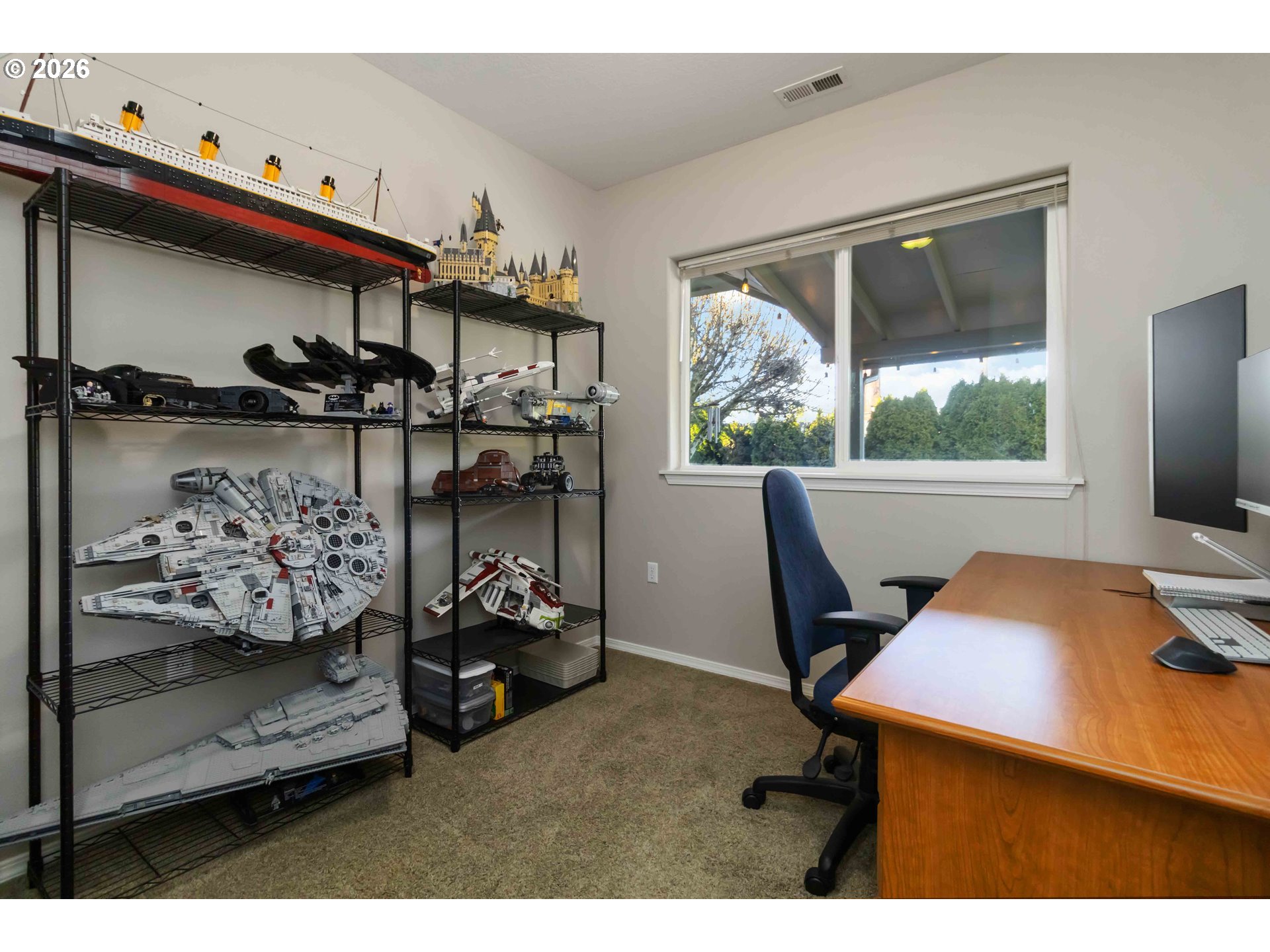 5558 Solo Point Drive Longview, WA 98632 - Photo 24 of 40 a view of a workspace with furniture and a window