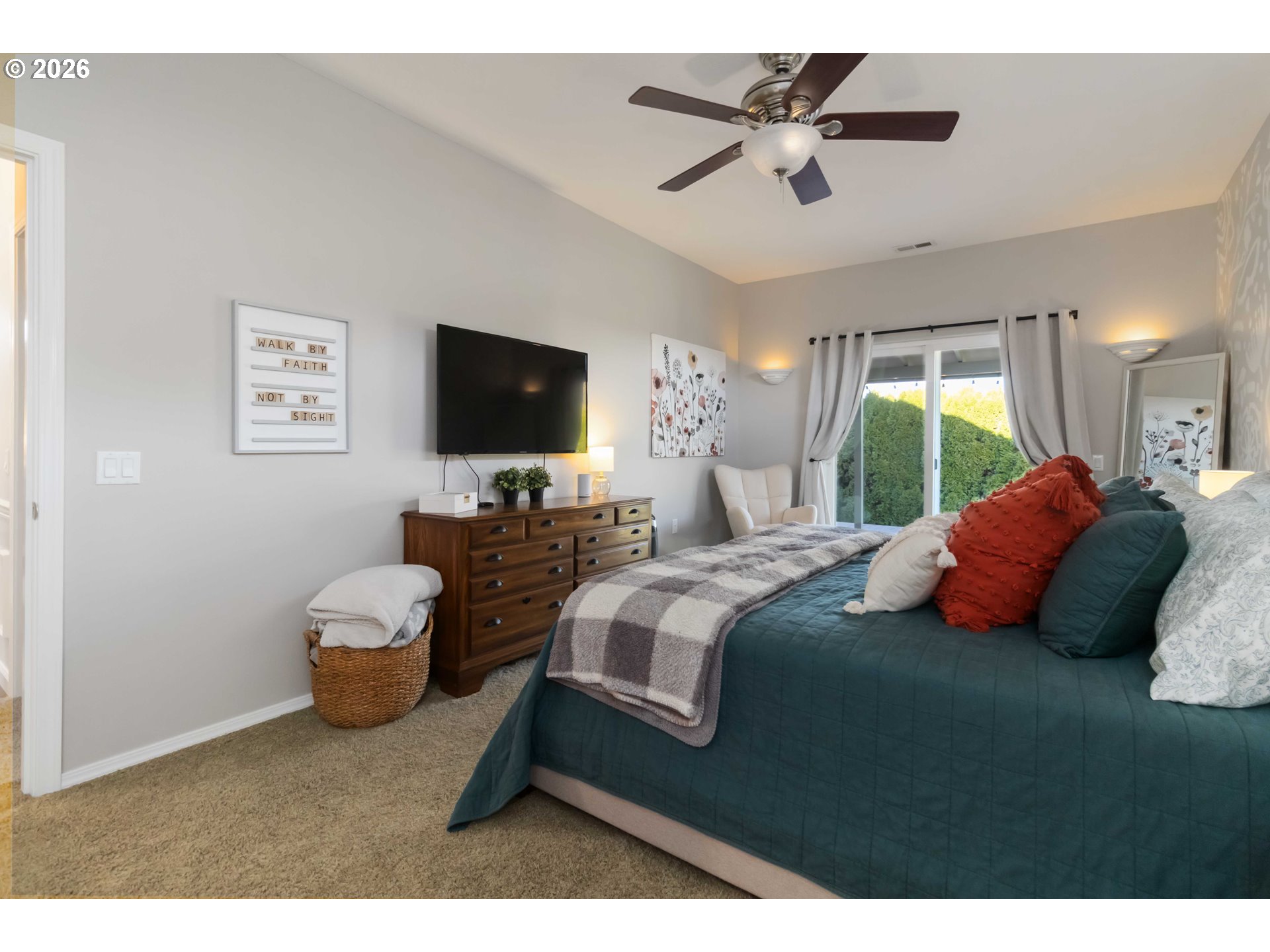 5558 Solo Point Drive Longview, WA 98632 - Photo 26 of 40 a bedroom with a bed and a flat screen tv