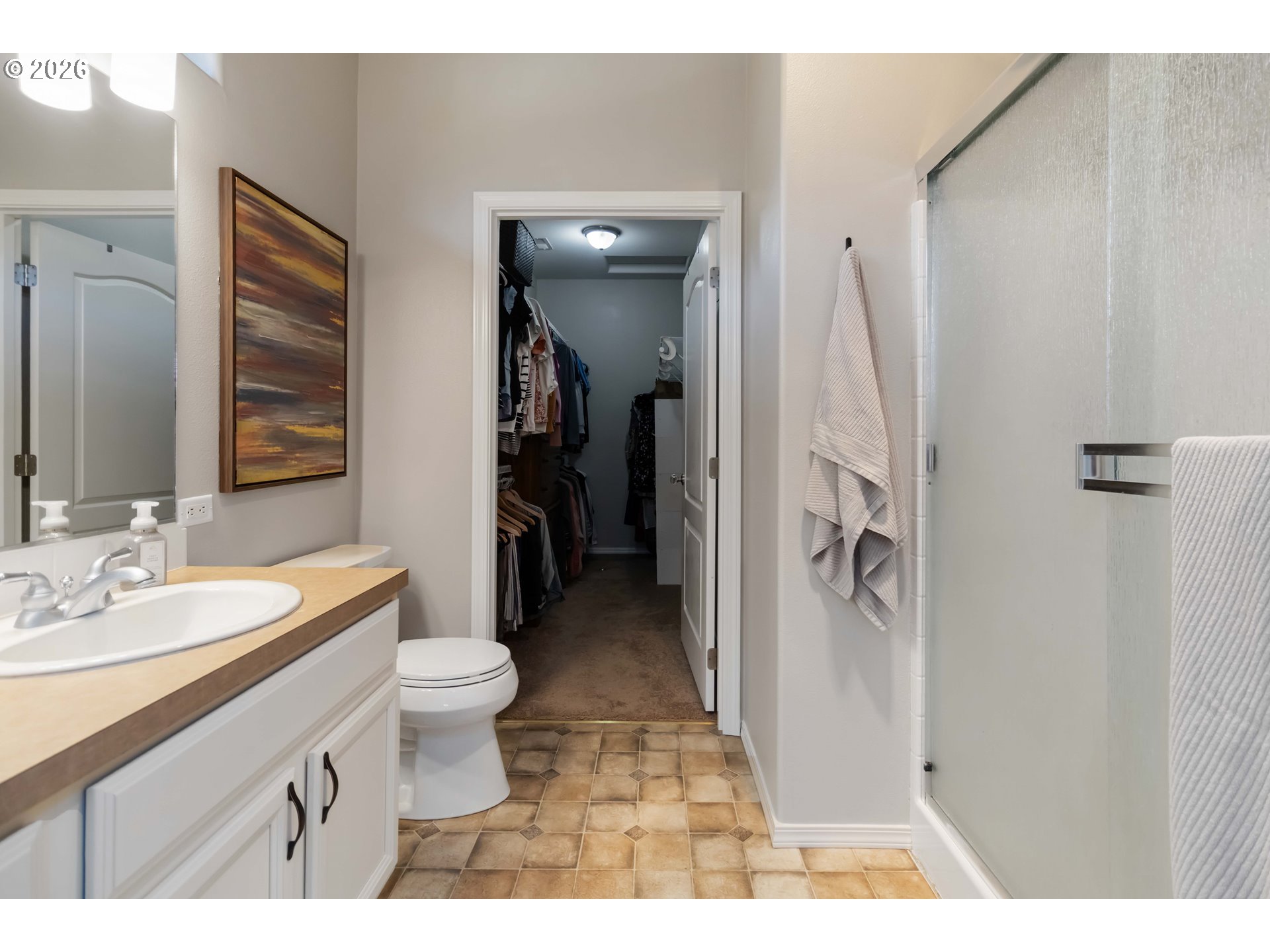 5558 Solo Point Drive Longview, WA 98632 - Photo 29 of 40 a bathroom with a sink a toilet and shower