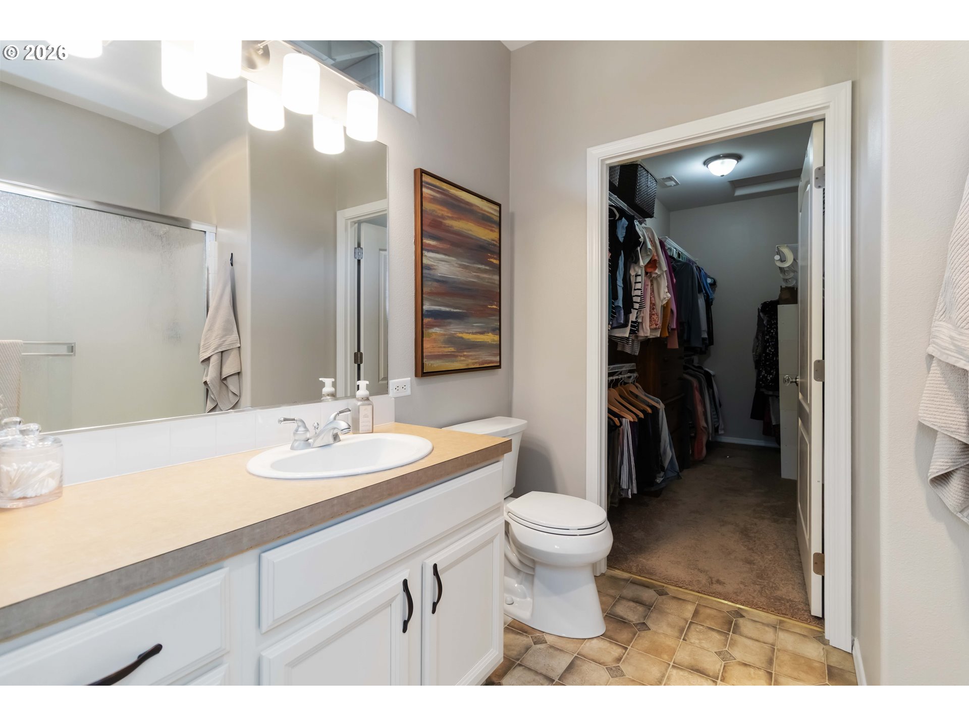 5558 Solo Point Drive Longview, WA 98632 - Photo 30 of 40 a bathroom with a sink a toilet and a mirror