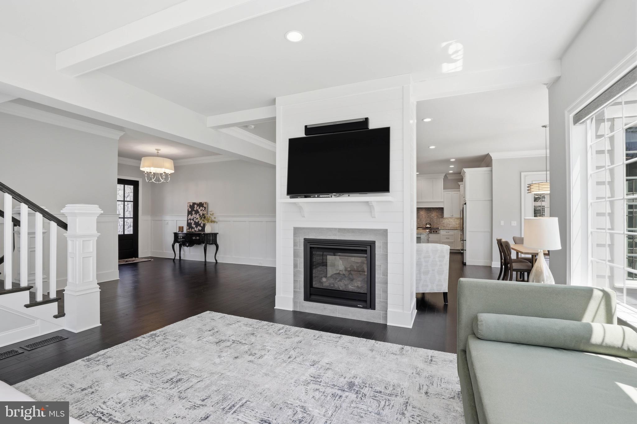 360 Addison Place Lancaster, PA 17601 - Photo 14 of 78 a living room with furniture a fireplace and a flat screen tv