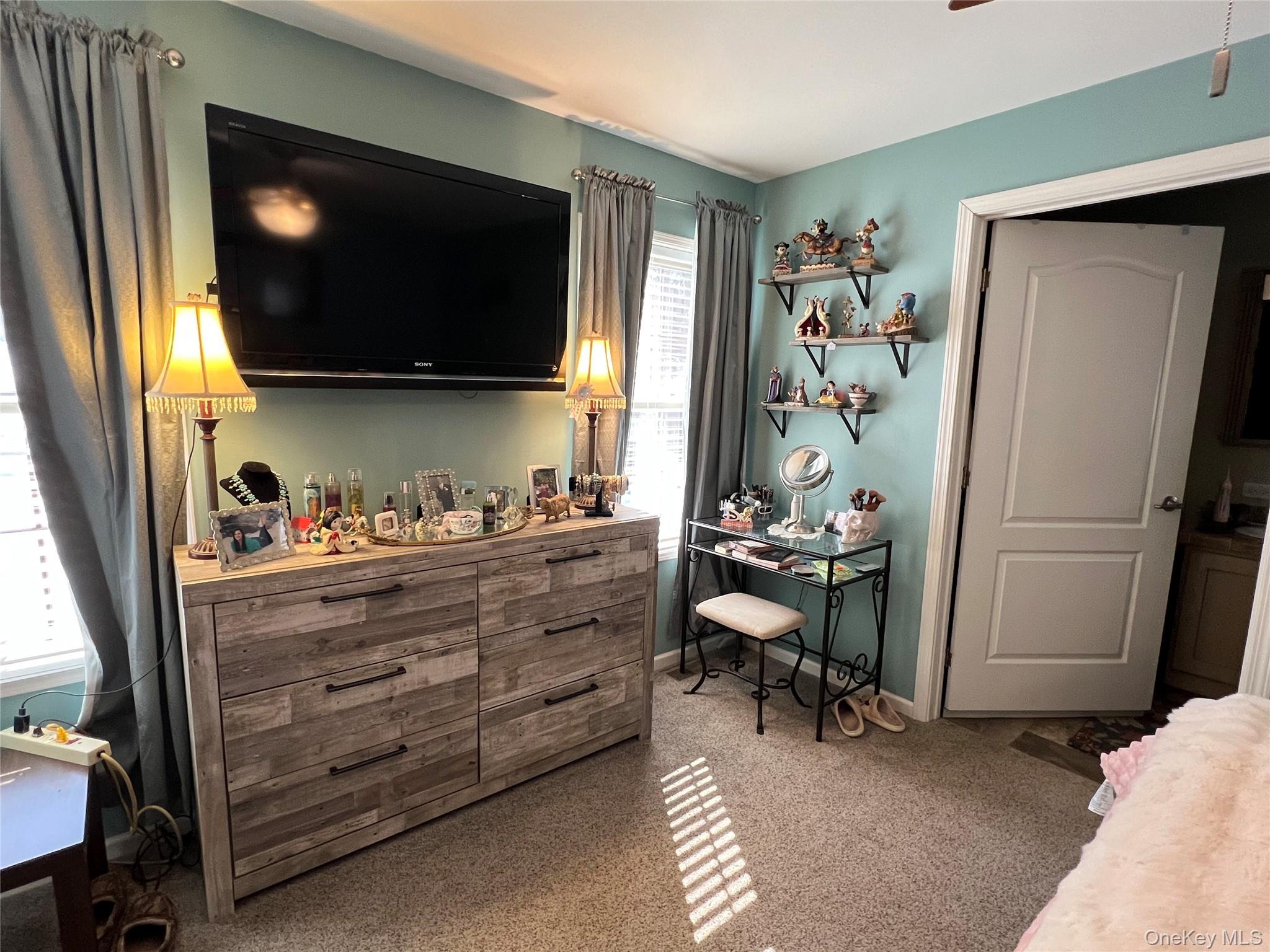 71 Midway Road Liberty, NY 12758 - Photo 11 of 23 a living room with furniture and a flat screen tv