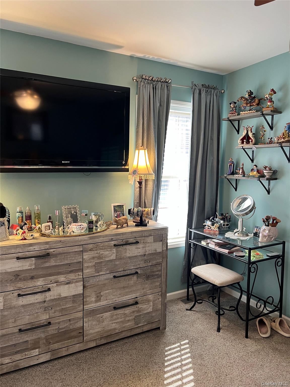 71 Midway Road Liberty, NY 12758 - Photo 14 of 23 a room with furniture and a flat screen tv