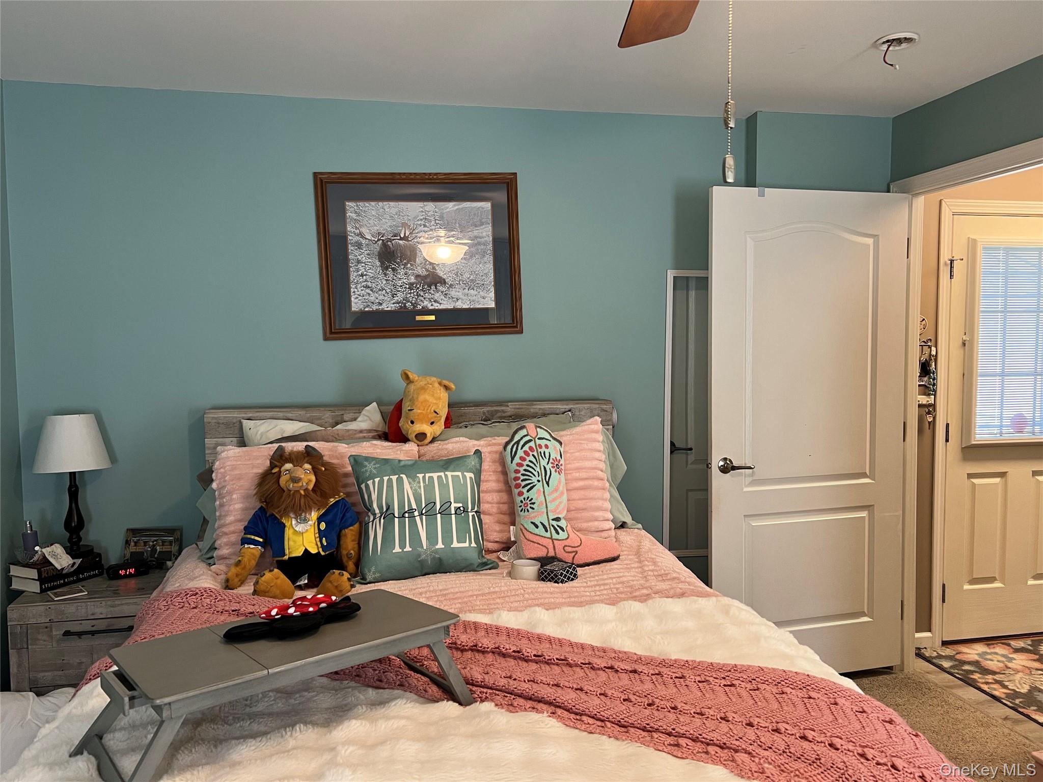 71 Midway Road Liberty, NY 12758 - Photo 15 of 23 a bedroom with bed and a chandelier