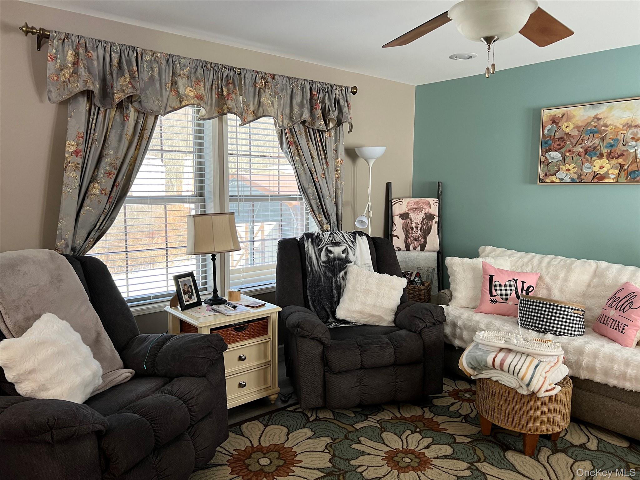 71 Midway Road Liberty, NY 12758 - Photo 10 of 23 a living room with furniture and a large window