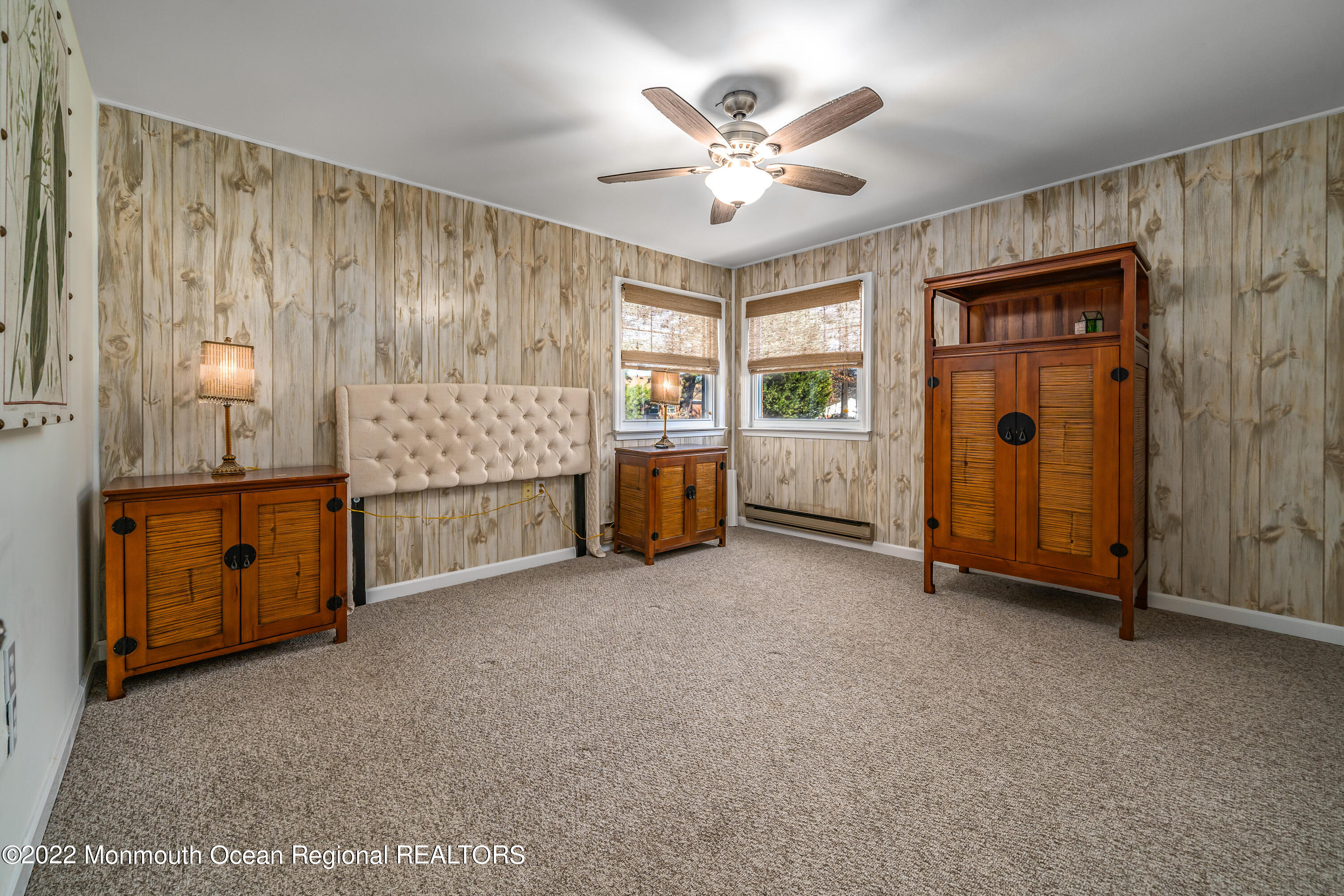 121 Constitution Boulevard, Unit B Whiting, NJ 08759 - Photo 12 of 20 a view of an empty room with a window