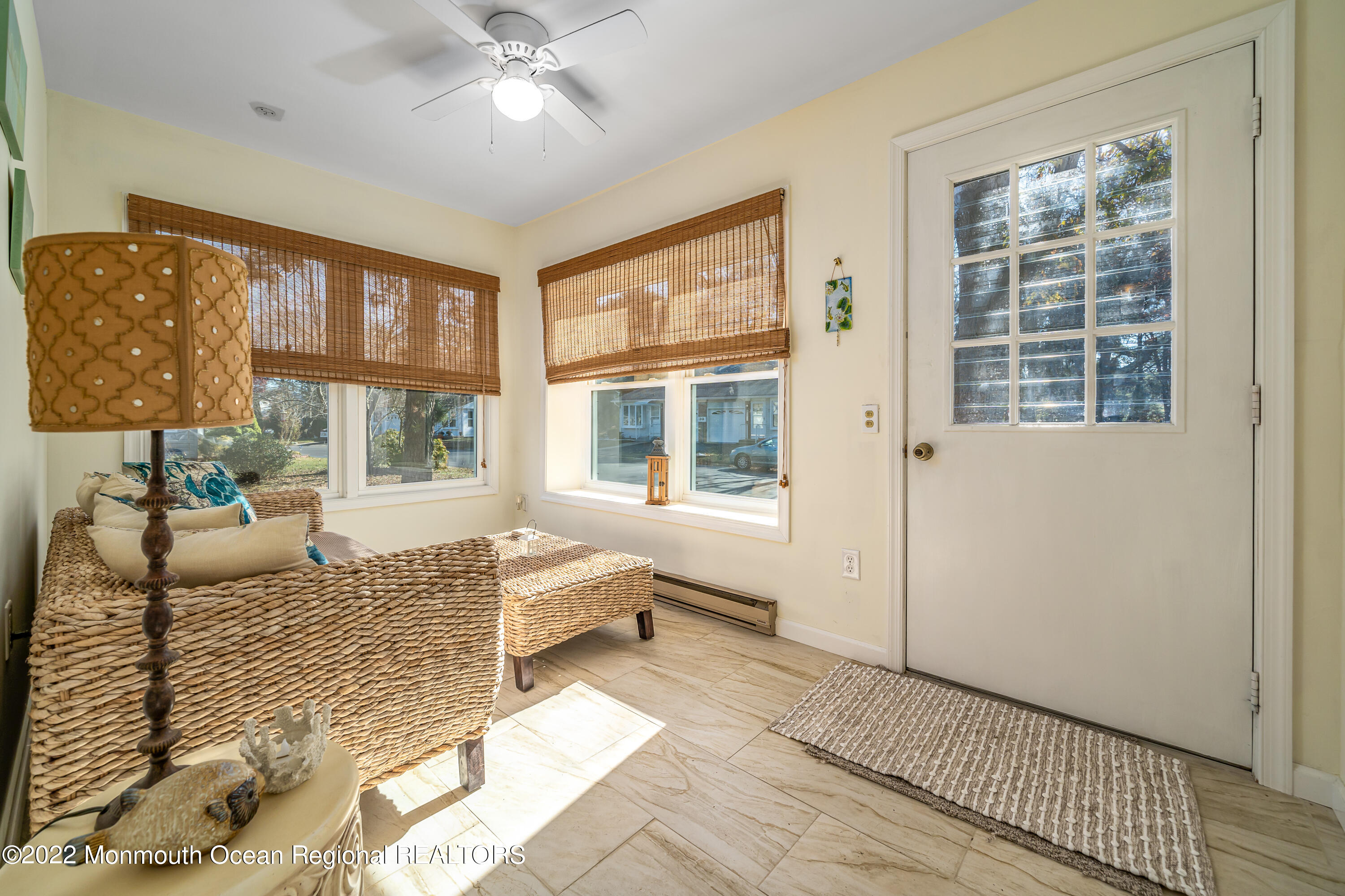 121 Constitution Boulevard, Unit B Whiting, NJ 08759 - Photo 5 of 20 a living room with furniture and windows
