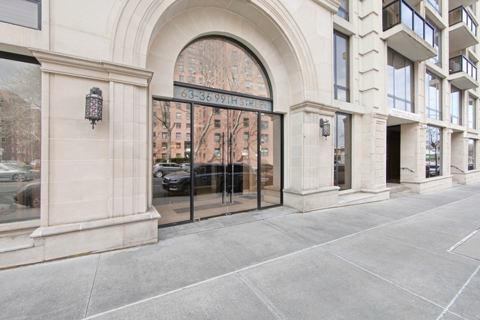 63-36 99th Street, Unit 8E Queens, NY 11374 - Photo 11 of 19 a view of an entryway with a glass door