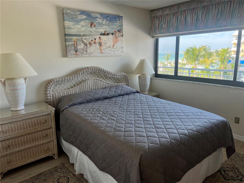 1001 Point Of Rocks Road, Unit 508 Sarasota, FL 34242 - Photo 3 of 34 a bedroom with a bed and window