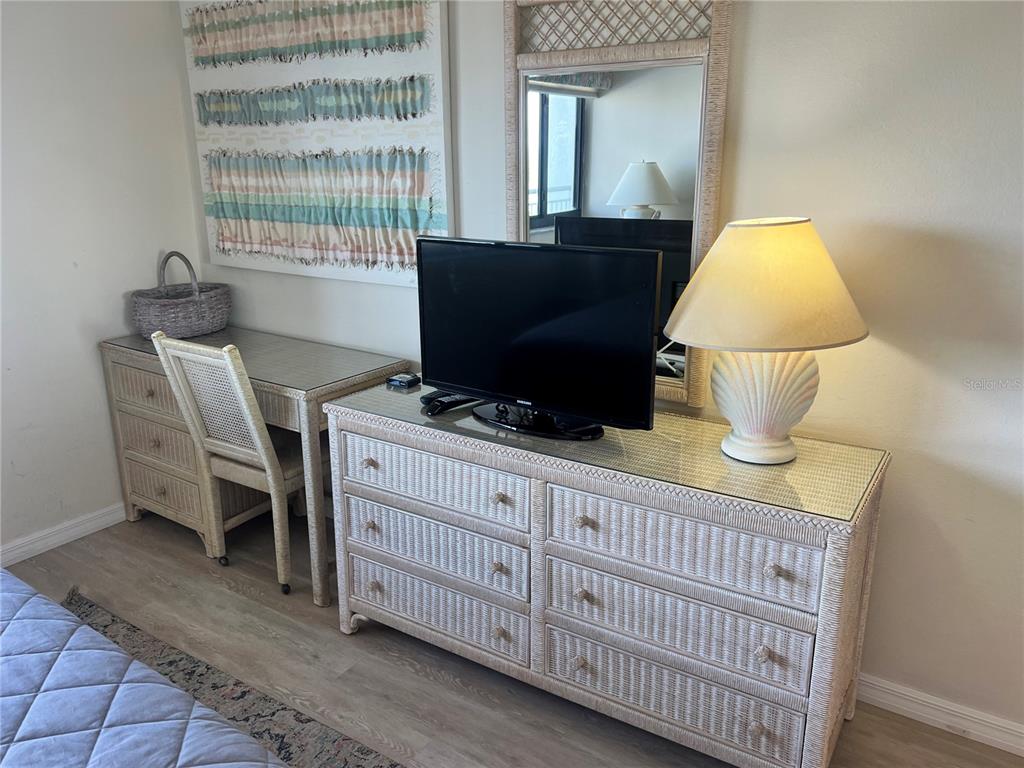 1001 Point Of Rocks Road, Unit 508 Sarasota, FL 34242 - Photo 4 of 34 a living room with furniture and a window