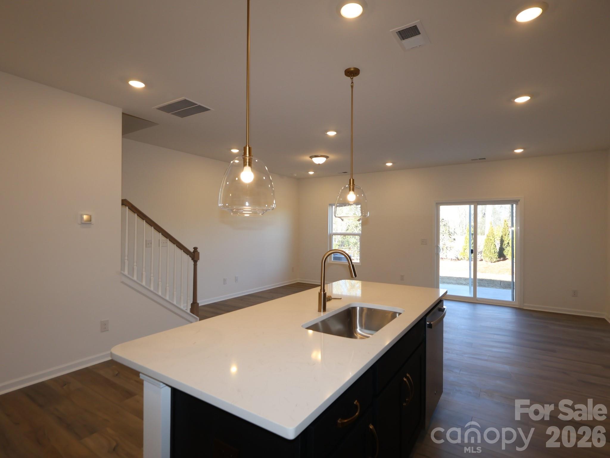 1152 Overbrook Place Wingate, NC 28174 - Photo 4 of 19 a kitchen with counter space and breakfast area