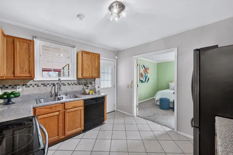a spacious bathroom with a sink a mirror and a bathtub
