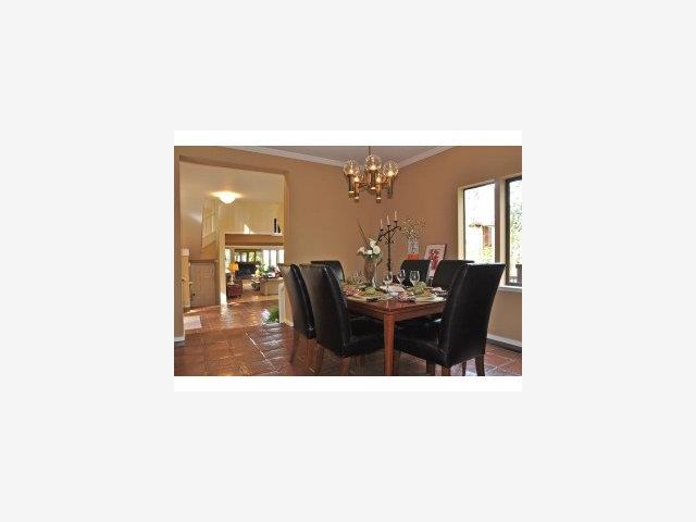 60 Hayfields Road Portola Valley, CA 94028 - Photo 4 of 9 a dining room with a wooden table and chairs