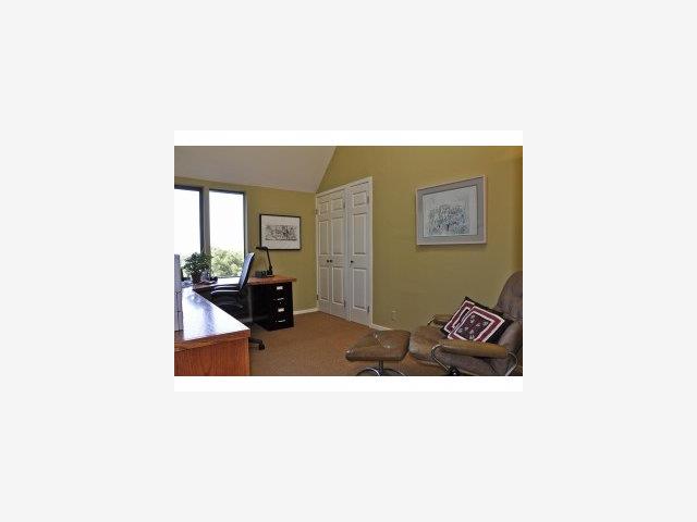 60 Hayfields Road Portola Valley, CA 94028 - Photo 6 of 9 a living room with furniture and a table