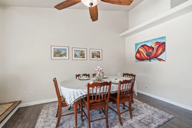 a kitchen with granite countertop a stainless steel appliances cabinets and a sink