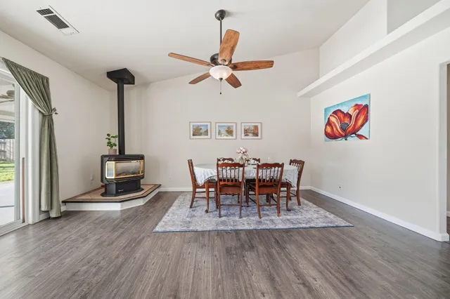 a view of a dining room with furniture