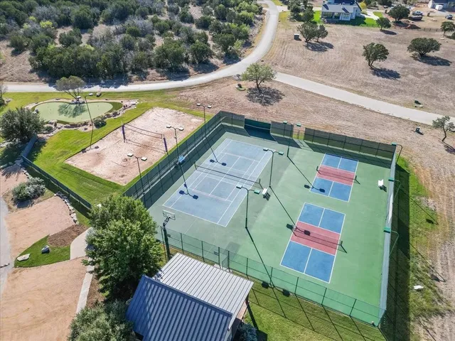 an aerial view of a house with a garden