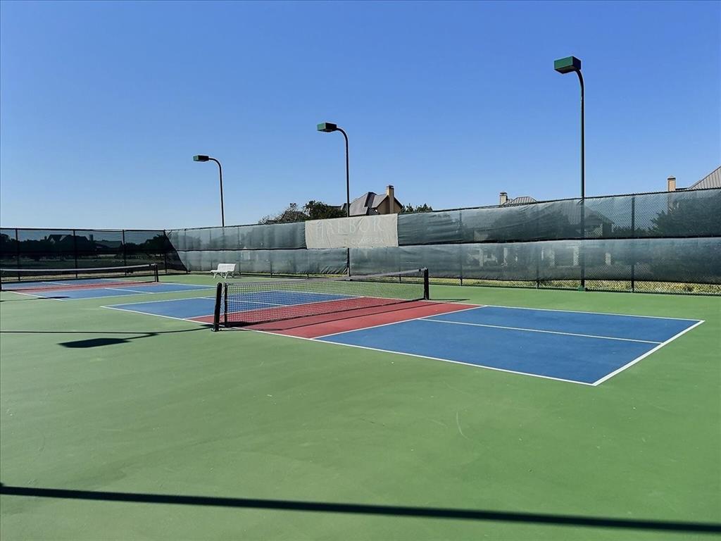 1653 Scenic Drive, Unit 102 Graford, TX 76449 - Photo 36 of 40 a view of a tennis court