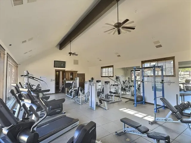 a view of a livingroom with furniture and a table
