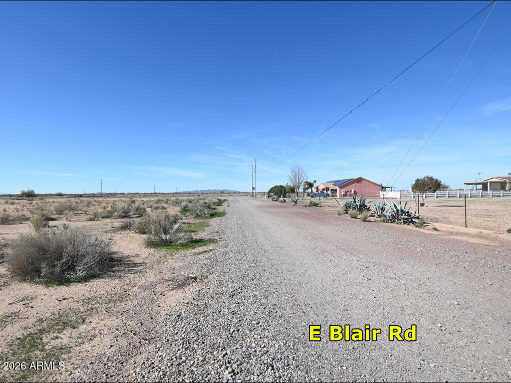 1 East Blair Road, Unit 1 Eloy, AZ 85131 - Photo 11 of 16 a view of a road with a building in the background