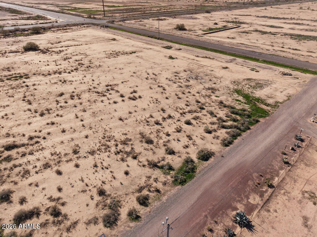 1 East Blair Road, Unit 1 Eloy, AZ 85131 - Photo 10 of 16 a view of a dry yard with wooden floor