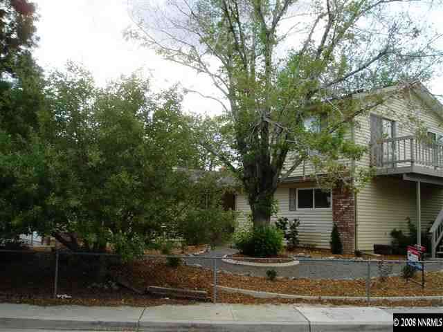 2705 Judith Lane Reno, NV 89503 - Photo 1 of 8 a front view of a house with yard
