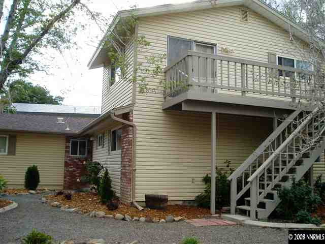 2705 Judith Lane Reno, NV 89503 - Photo 2 of 8 a front view of a house with garden